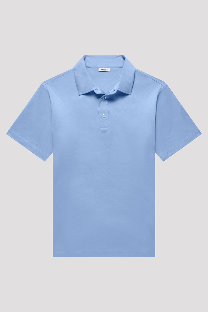 Flatlay of men's blue polo shirt made from Egyptian cotton
