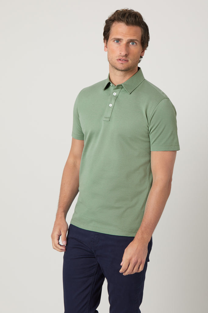 Front view of model wearing men's Jade Green polo shirt made from Egyptian cotton