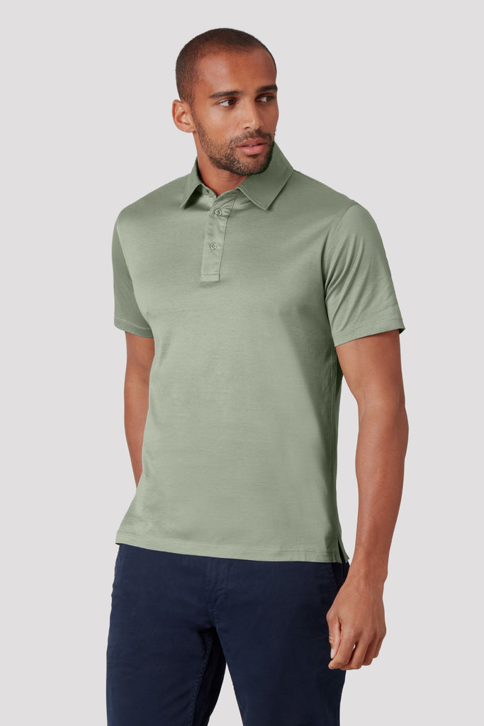 Front view of model wearing men's Tuscan Sage Green polo shirt made from Sea Island cotton